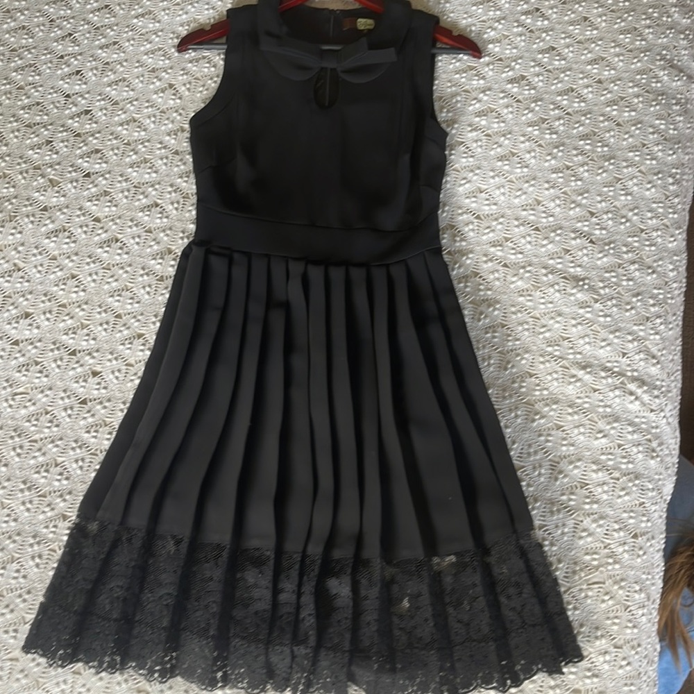 Eva Franco Women's Black Dress with Collar and bow. Pleated skirt with lace. 2